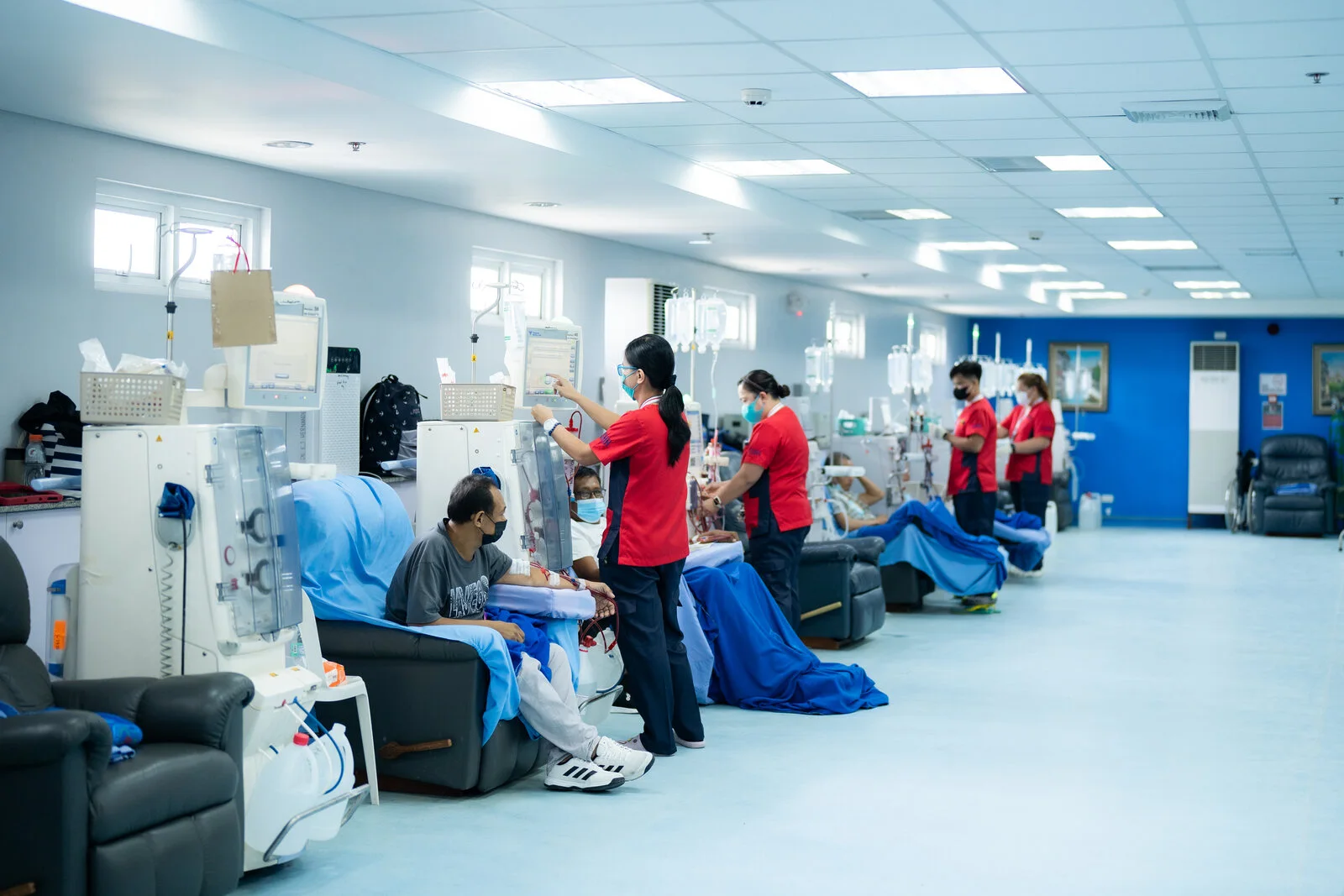 Nurses caring for patients in the hemodialysis unit at Urdaneta Sacred Heart Hospital